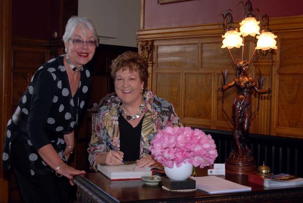 Guest, Jennifer Sutherland, getting her new Jo Seagar book signed.